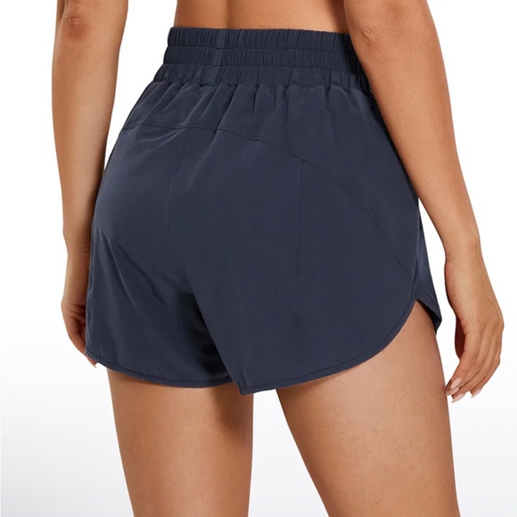 NWT CRZ YOGA navy sport shorts. Small pack pocket. Stretchy and lightweight - Picture 4 of 5